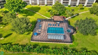 THIS STUNNING DESIGNER MODEL 2 BEDROOM, 2 BATH CONDO BOASTS 1800 on Boca Dunes Golf and Country Club in Florida - for sale on GolfHomes.com, golf home, golf lot