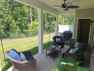 This stunning end-unit townhome in the Magnolia Green community on The Westham Golf Club At Magnolia Green in Virginia - for sale on GolfHomes.com, golf home, golf lot