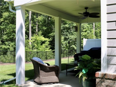 This stunning end-unit townhome in the Magnolia Green community on The Westham Golf Club At Magnolia Green in Virginia - for sale on GolfHomes.com, golf home, golf lot