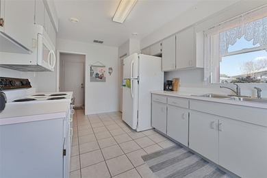 You will love this well-maintained, light and bright home in the on Highland Fairways Golf Club in Florida - for sale on GolfHomes.com, golf home, golf lot