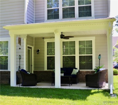 This stunning end-unit townhome in the Magnolia Green community on The Westham Golf Club At Magnolia Green in Virginia - for sale on GolfHomes.com, golf home, golf lot