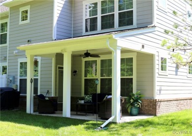 This stunning end-unit townhome in the Magnolia Green community on The Westham Golf Club At Magnolia Green in Virginia - for sale on GolfHomes.com, golf home, golf lot