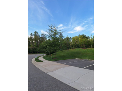 This stunning end-unit townhome in the Magnolia Green community on The Westham Golf Club At Magnolia Green in Virginia - for sale on GolfHomes.com, golf home, golf lot