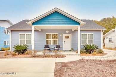 Coastal charm and a fantastic location come together in this on Oak Island Golf Club in North Carolina - for sale on GolfHomes.com, golf home, golf lot