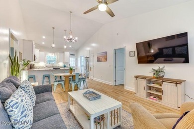 Coastal charm and a fantastic location come together in this on Oak Island Golf Club in North Carolina - for sale on GolfHomes.com, golf home, golf lot