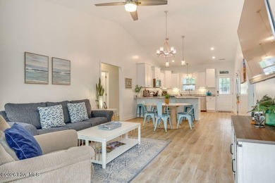 Coastal charm and a fantastic location come together in this on Oak Island Golf Club in North Carolina - for sale on GolfHomes.com, golf home, golf lot