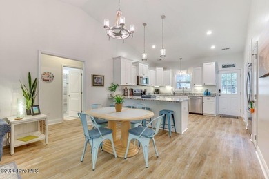 Coastal charm and a fantastic location come together in this on Oak Island Golf Club in North Carolina - for sale on GolfHomes.com, golf home, golf lot