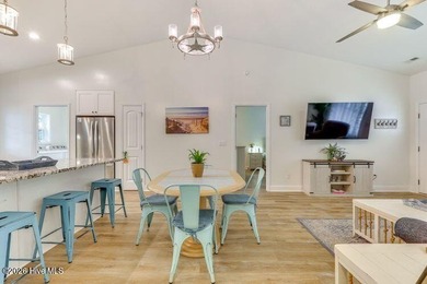 Coastal charm and a fantastic location come together in this on Oak Island Golf Club in North Carolina - for sale on GolfHomes.com, golf home, golf lot