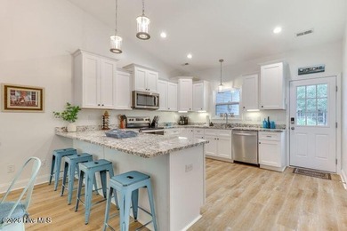 Coastal charm and a fantastic location come together in this on Oak Island Golf Club in North Carolina - for sale on GolfHomes.com, golf home, golf lot