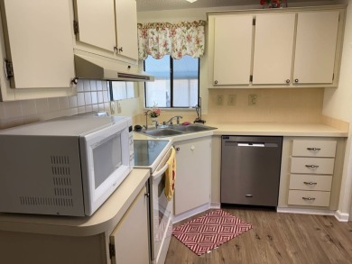 This lovely, 2/2 manufactured home is on leased land. Located in on Pine Lakes Country Club in Florida - for sale on GolfHomes.com, golf home, golf lot