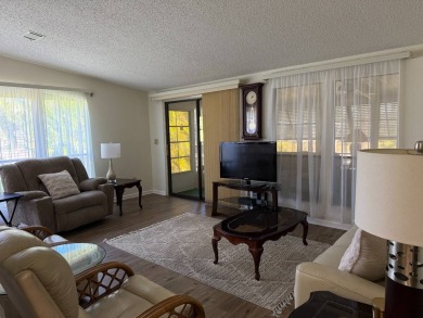 This lovely, 2/2 manufactured home is on leased land. Located in on Pine Lakes Country Club in Florida - for sale on GolfHomes.com, golf home, golf lot