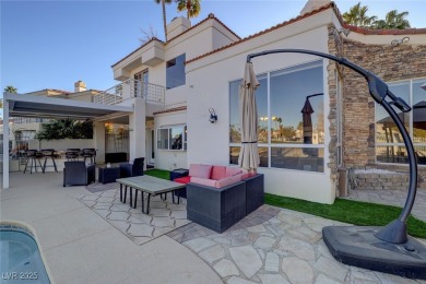 Welcome to this 4-bedroom, 4-bath Painted Desert gem overlooking on Painted Desert Golf Club in Nevada - for sale on GolfHomes.com, golf home, golf lot