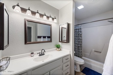 Nestled among peaceful pines, this fully furnished 3 bedroom, 2 on Pinetop Lakes Golf and Country Club in Arizona - for sale on GolfHomes.com, golf home, golf lot