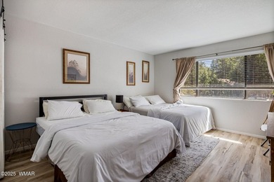 Nestled among peaceful pines, this fully furnished 3 bedroom, 2 on Pinetop Lakes Golf and Country Club in Arizona - for sale on GolfHomes.com, golf home, golf lot