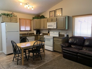 Stay, Play, and Get Paid! This turnkey 2-Bedrooms, 1-Bath condo on Sunbrook Golf Course in Utah - for sale on GolfHomes.com, golf home, golf lot