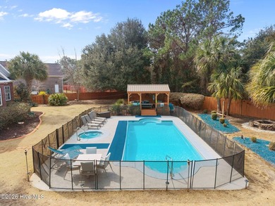 Are you looking for a Turn-Key home with a backyard pool oasis on Beau Rivage Golf and Resort in North Carolina - for sale on GolfHomes.com, golf home, golf lot