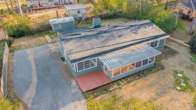 This adorable home offers the perfect blend of casual living and on Hide-A-Way Lake Golf Course in Texas - for sale on GolfHomes.com, golf home, golf lot