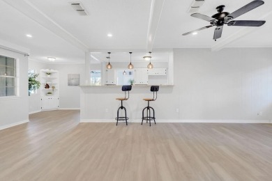 This adorable home offers the perfect blend of casual living and on Hide-A-Way Lake Golf Course in Texas - for sale on GolfHomes.com, golf home, golf lot