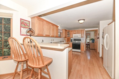 Welcome to this ranch-style condominium that's walking distance on Rivermoor Golf Club in Wisconsin - for sale on GolfHomes.com, golf home, golf lot