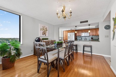 Enjoy convenience, privacy, and security in this light-filled on Belleair Country Club in Florida - for sale on GolfHomes.com, golf home, golf lot