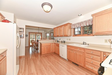 Welcome to this ranch-style condominium that's walking distance on Rivermoor Golf Club in Wisconsin - for sale on GolfHomes.com, golf home, golf lot