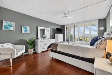 Enjoy convenience, privacy, and security in this light-filled on Belleair Country Club in Florida - for sale on GolfHomes.com, golf home, golf lot