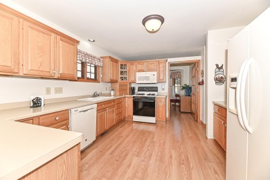 Welcome to this ranch-style condominium that's walking distance on Rivermoor Golf Club in Wisconsin - for sale on GolfHomes.com, golf home, golf lot