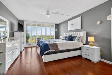 Enjoy convenience, privacy, and security in this light-filled on Belleair Country Club in Florida - for sale on GolfHomes.com, golf home, golf lot