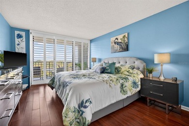 Enjoy convenience, privacy, and security in this light-filled on Belleair Country Club in Florida - for sale on GolfHomes.com, golf home, golf lot