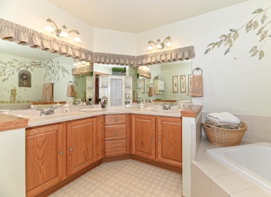 Welcome to this ranch-style condominium that's walking distance on Rivermoor Golf Club in Wisconsin - for sale on GolfHomes.com, golf home, golf lot