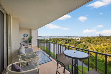 Enjoy convenience, privacy, and security in this light-filled on Belleair Country Club in Florida - for sale on GolfHomes.com, golf home, golf lot