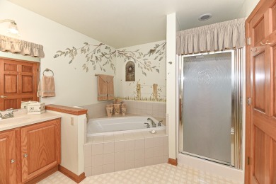 Welcome to this ranch-style condominium that's walking distance on Rivermoor Golf Club in Wisconsin - for sale on GolfHomes.com, golf home, golf lot