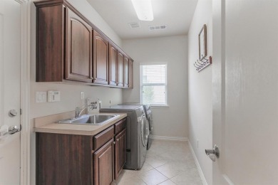 This popular Sienna Model on corner lot in Robson Ranch is the on Wildhorse Golf Club of Robson Ranch in Texas - for sale on GolfHomes.com, golf home, golf lot