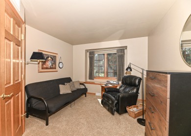 Welcome to this ranch-style condominium that's walking distance on Rivermoor Golf Club in Wisconsin - for sale on GolfHomes.com, golf home, golf lot