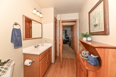 Welcome to this ranch-style condominium that's walking distance on Rivermoor Golf Club in Wisconsin - for sale on GolfHomes.com, golf home, golf lot