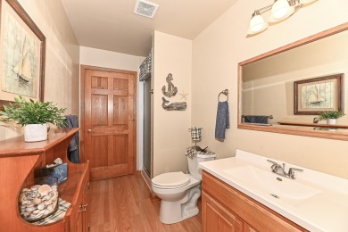 Welcome to this ranch-style condominium that's walking distance on Rivermoor Golf Club in Wisconsin - for sale on GolfHomes.com, golf home, golf lot