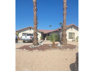 This home sports beautiful views and an amazing neighborhood for on Sands RV and Golf Resort in California - for sale on GolfHomes.com, golf home, golf lot