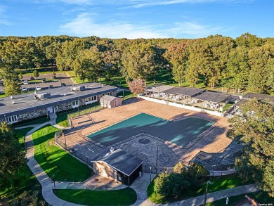 Homeowners pride exudes in this Baronet model condo boasting on Leisure Village Golf Course in New York - for sale on GolfHomes.com, golf home, golf lot