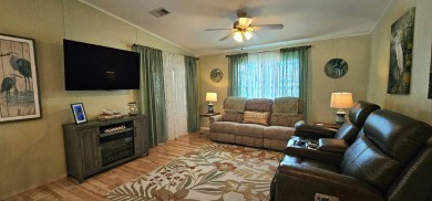 Modern and Updated 2 bedroom 2 bath home WITH EXTRAS in 55 + on Zephyrhills Municipal Golf Course in Florida - for sale on GolfHomes.com, golf home, golf lot
