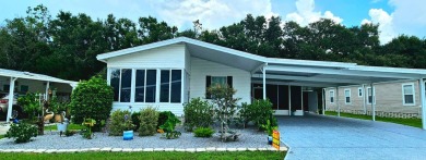 Modern and Updated 2 bedroom 2 bath home WITH EXTRAS in 55 + on Zephyrhills Municipal Golf Course in Florida - for sale on GolfHomes.com, golf home, golf lot