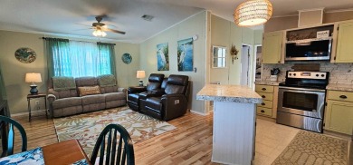 Modern and Updated 2 bedroom 2 bath home WITH EXTRAS in 55 + on Zephyrhills Municipal Golf Course in Florida - for sale on GolfHomes.com, golf home, golf lot