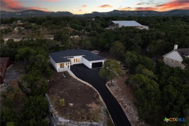 This contemporary modern oasis is an entertainers paradise, on a on Canyon Lake Golf Club in Texas - for sale on GolfHomes.com, golf home, golf lot