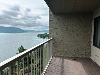 Enjoy the sunrises on the balcony with million dollar lakeviews on Bristol Harbour Golf Club in New York - for sale on GolfHomes.com, golf home, golf lot