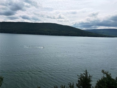 Enjoy the sunrises on the balcony with million dollar lakeviews on Bristol Harbour Golf Club in New York - for sale on GolfHomes.com, golf home, golf lot