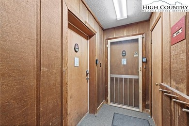 TURNKEY, SLOPESIDE condo overlooking Easy Street ski run and on Sugar Mountain Golf Course in North Carolina - for sale on GolfHomes.com, golf home, golf lot