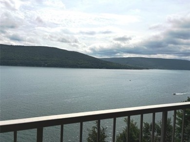 Enjoy the sunrises on the balcony with million dollar lakeviews on Bristol Harbour Golf Club in New York - for sale on GolfHomes.com, golf home, golf lot