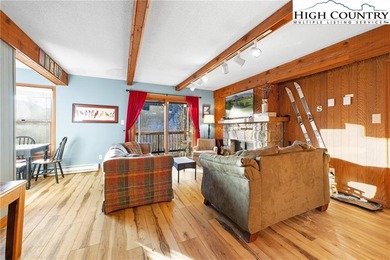 TURNKEY, SLOPESIDE condo overlooking Easy Street ski run and on Sugar Mountain Golf Course in North Carolina - for sale on GolfHomes.com, golf home, golf lot