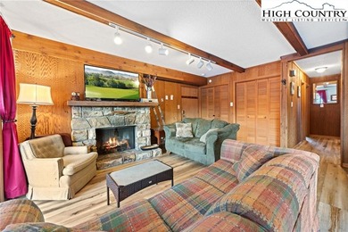 TURNKEY, SLOPESIDE condo overlooking Easy Street ski run and on Sugar Mountain Golf Course in North Carolina - for sale on GolfHomes.com, golf home, golf lot