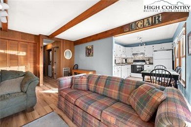 TURNKEY, SLOPESIDE condo overlooking Easy Street ski run and on Sugar Mountain Golf Course in North Carolina - for sale on GolfHomes.com, golf home, golf lot