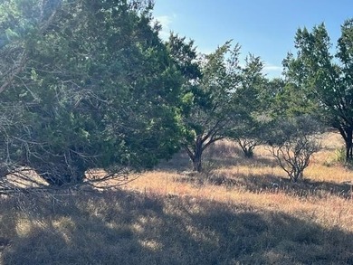 Discover the perfect setting for a refined Hill Country retreat on Slick Rock Golf Course - Horseshoe Bay in Texas - for sale on GolfHomes.com, golf home, golf lot